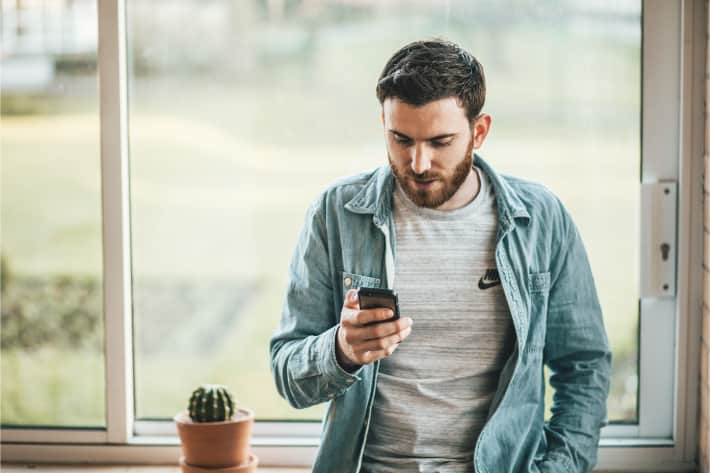 man-holding-phone.jpg